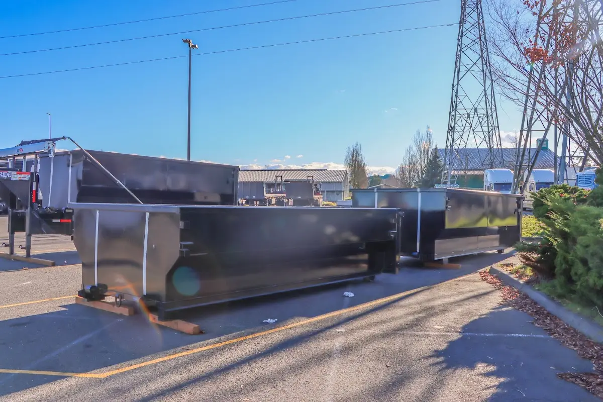Roll-off dumpster ready for waste disposal at job site for 3 Yard Dumpster Rental in Fresno